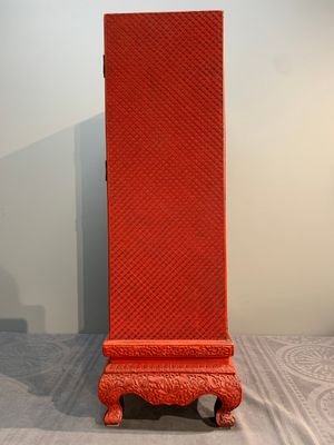 A Chinese cinnabar lacquer 'mountainous landscape' cabinet on a stand, 19th C. — photo 16