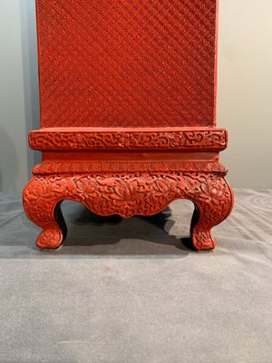 A Chinese cinnabar lacquer 'mountainous landscape' cabinet on a stand, 19th C. — photo 22
