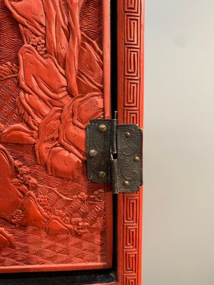 A Chinese cinnabar lacquer 'mountainous landscape' cabinet on a stand, 19th C. — photo 8