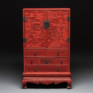 A Chinese cinnabar lacquer 'mountainous landscape' cabinet on a stand, 19th C. — photo 3