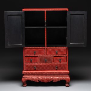A Chinese cinnabar lacquer 'mountainous landscape' cabinet on a stand, 19th C. — photo 4