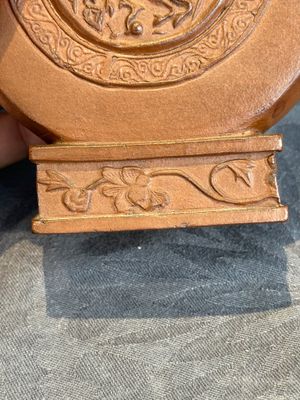 A Chinese circle-shaped Yixing stoneware 'kylin' teapot with relief design, Kangxi — photo 12