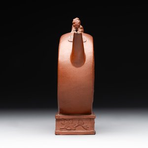 A Chinese circle-shaped Yixing stoneware 'kylin' teapot with relief design, Kangxi — photo 2