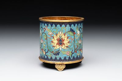 A Chinese cloisonné cylindrical tripod censer with lotus scrolls, Qianlong mark and of the period