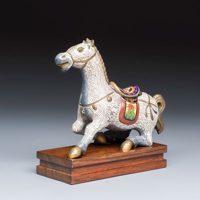 A Chinese cloisonné model of a horse, 20th C.