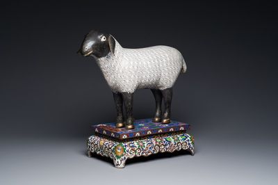 A Chinese cloisonné model of a sheep standing on a rectangular base with Arabic inscription, Qing