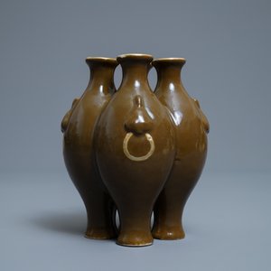 A Chinese conjoined four-part brown-glazed vase, Qianlong mark, 19/20th C. — photo 2