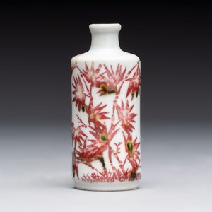 A Chinese copper-red and white 'bamboo' snuff bottle, Qianlong mark, 19th C. — photo 1
