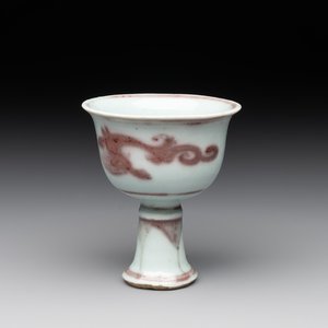 A Chinese copper-red and white 'chilong' stem cup, Ming — photo 1