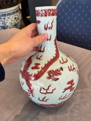 A Chinese copper-red and white 'dragon' bottle vase, 18th C. — photo 4