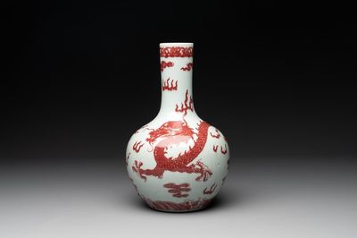 A Chinese copper-red and white 'dragon' bottle vase, 18th C.