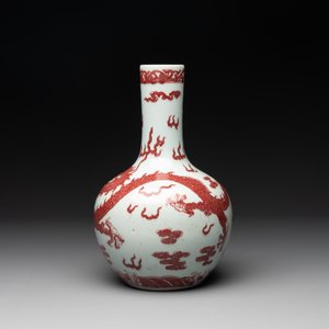 A Chinese copper-red and white 'dragon' bottle vase, 18th C. — photo 2