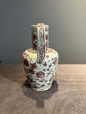 A Chinese copper-red and white 'flower scroll' ewer, Ming or later — photo 2
