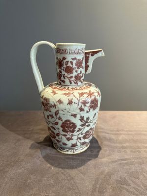 A Chinese copper-red and white 'flower scroll' ewer, Ming or later — photo 3