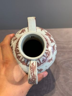 A Chinese copper-red and white 'flower scroll' ewer, Ming or later — photo 5