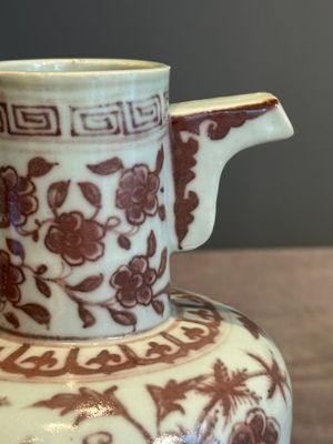A Chinese copper-red and white 'flower scroll' ewer, Ming or later — photo 6