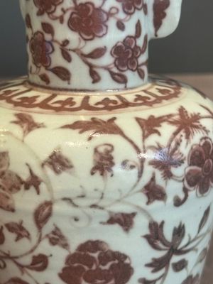 A Chinese copper-red and white 'flower scroll' ewer, Ming or later — photo 7