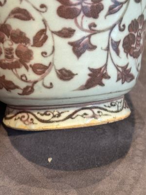 A Chinese copper-red and white 'flower scroll' ewer, Ming or later — photo 10