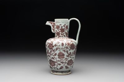 A Chinese copper-red and white 'flower scroll' ewer, Ming or later