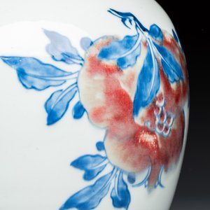 A Chinese copper-red, blue and white 'Fruits' jar with a jade-inset wooden cover and a stand — photo 9
