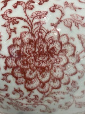 A Chinese copper-red bottle vase with floral scrolls, Qianlong — photo 19