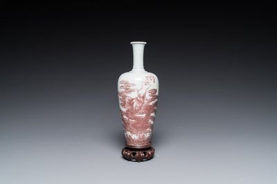 A Chinese copper-red ‘dragon’ vase on wooden stand, Kangxi mark, 19/20th C.