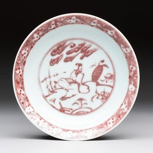 A Chinese copper-red plate with figural design, possibly Ming — photo 1