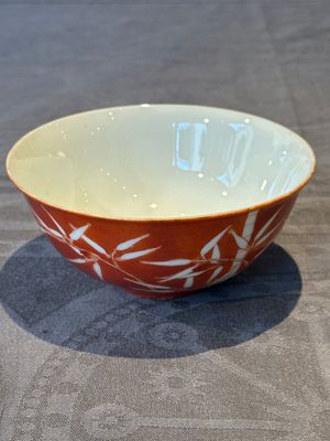 A Chinese coral-red-glazed bowl with reverse-decorated bamboo design, Xuantong mark and of the period — 照片 1