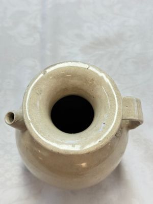 A Chinese cream-glazed ewer with a barrel-shaped body, Hebei/Henan provinces, Tang/Five Dynasties — photo 11