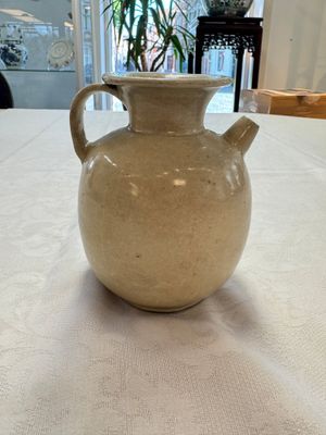 A Chinese cream-glazed ewer with a barrel-shaped body, Hebei/Henan provinces, Tang/Five Dynasties — photo 3