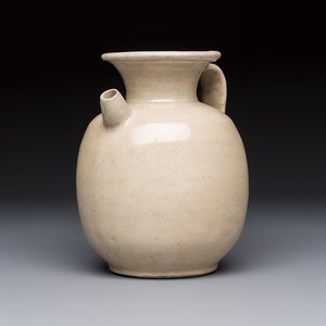 A Chinese cream-glazed ewer with a barrel-shaped body, Hebei/Henan provinces, Tang/Five Dynasties — photo 1