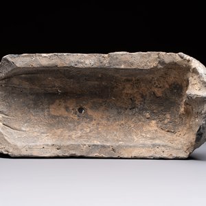 A Chinese cream-glazed pillow, a grey terracotta roof tile and a grey-glazed cover, Republic and earlier — photo 13