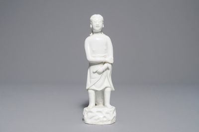 A Chinese Dehua blanc de Chine figure of 'Adam', Kangxi