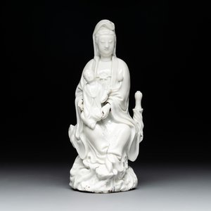 A Chinese Dehua blanc de Chine figure of Guanyin with a boy, Kangxi/Qianlong — photo 1
