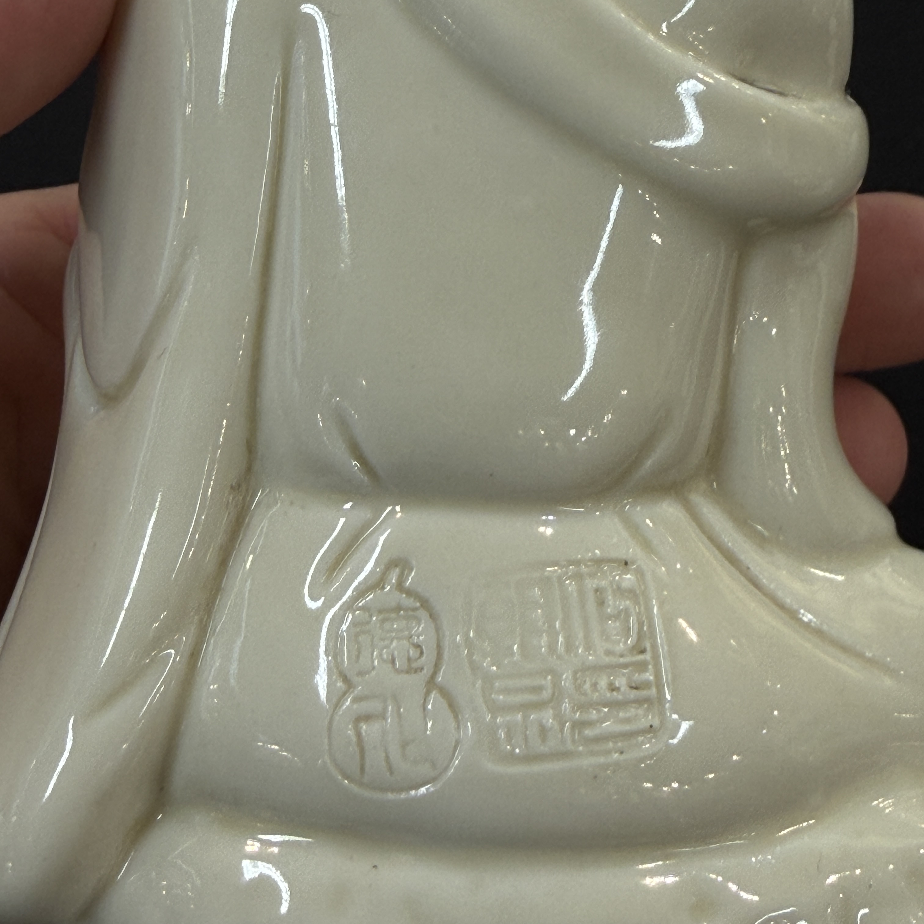 A Chinese Dehua blanc de Chine figure of Luohan and three monochrome wares, one with a wooden stand — photo 4