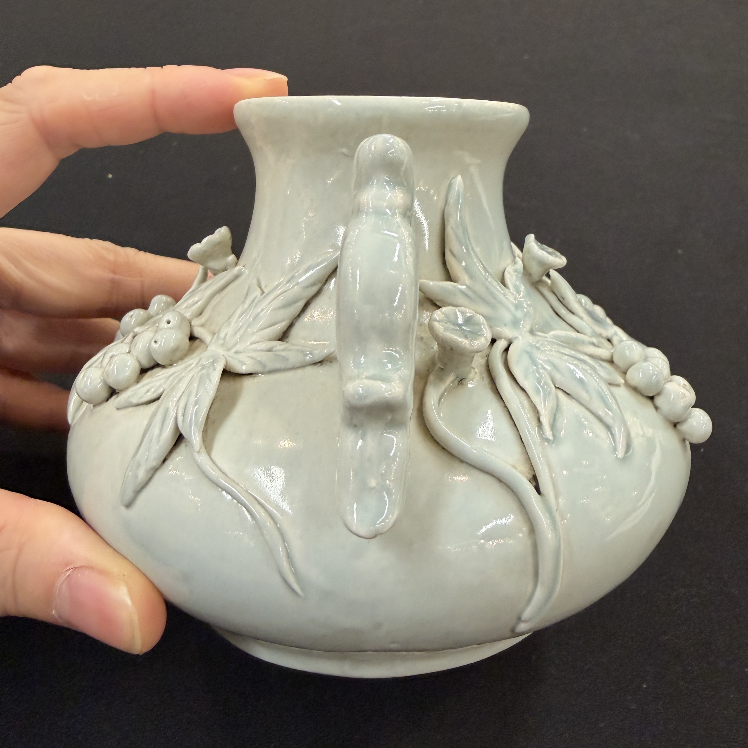 A Chinese Dehua blanc de Chine figure of Luohan and three monochrome wares, one with a wooden stand — photo 25
