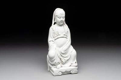 A Chinese Dehua blanc de Chine figure of Wenchang, 20th C.