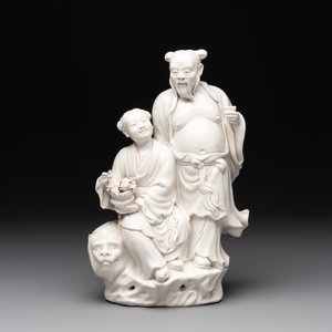 A Chinese Dehua blanc de Chine group of a man and a seated boy on a lion, 20th C. — 照片 2