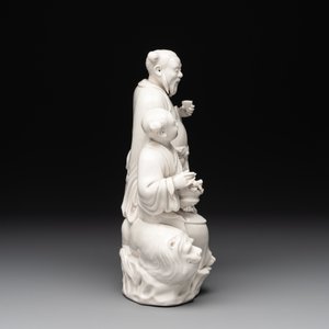 A Chinese Dehua blanc de Chine group of a man and a seated boy on a lion, 20th C. — 照片 3