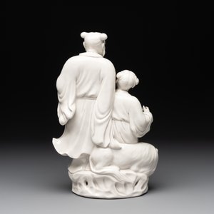 A Chinese Dehua blanc de Chine group of a man and a seated boy on a lion, 20th C. — 照片 4