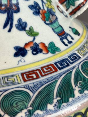 A Chinese doucai 'antiquities' 'hu' vase, Qianlong mark, 19th C. — photo 12