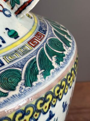 A Chinese doucai 'antiquities' 'hu' vase, Qianlong mark, 19th C. — photo 13