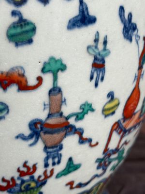 A Chinese doucai 'antiquities' 'hu' vase, Qianlong mark, 19th C. — photo 16