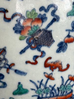 A Chinese doucai 'antiquities' 'hu' vase, Qianlong mark, 19th C. — photo 20