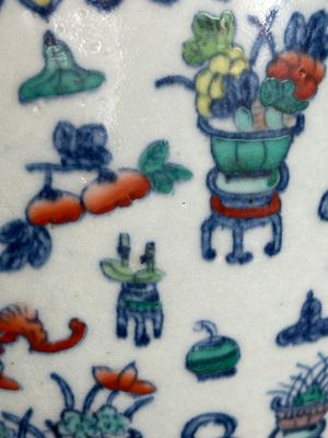 A Chinese doucai 'antiquities' 'hu' vase, Qianlong mark, 19th C. — photo 22