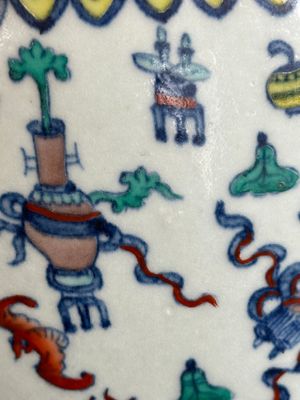 A Chinese doucai 'antiquities' 'hu' vase, Qianlong mark, 19th C. — photo 23