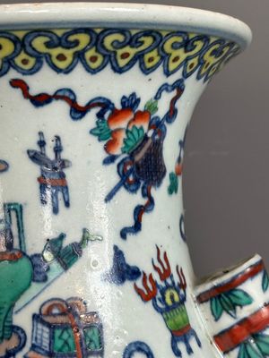A Chinese doucai 'antiquities' 'hu' vase, Qianlong mark, 19th C. — photo 6