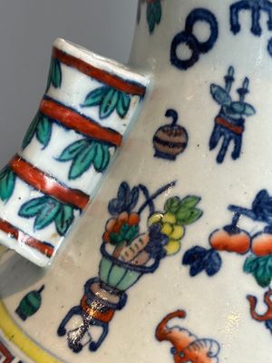 A Chinese doucai 'antiquities' 'hu' vase, Qianlong mark, 19th C. — photo 9