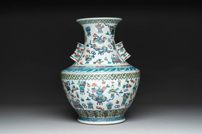 A Chinese doucai 'antiquities' 'hu' vase, Qianlong mark, 19th C.