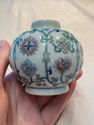 A Chinese doucai 'bajixiang' vase with a reticulated wooden cover, Yongzheng mark, 19/20th C. — photo 4